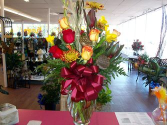 Mixed Vase Arrangement in Fall Colors  from Bunn Flowers & Gifts, local florist in Pittsburg, TX