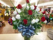 Vase of 18 red roses from Bunn Flowers & Gifts, local florist in Pittsburg, TX