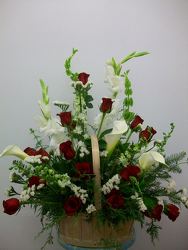 Basket of roses, callas and assorted mixed flowers from Bunn Flowers & Gifts, local florist in Pittsburg, TX