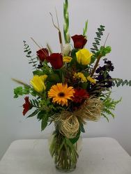 Mixed vase arrangement of assorted fall flowers from Bunn Flowers & Gifts, local florist in Pittsburg, TX