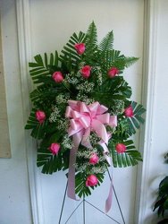 Standing spray of pink roses from Bunn Flowers & Gifts, local florist in Pittsburg, TX